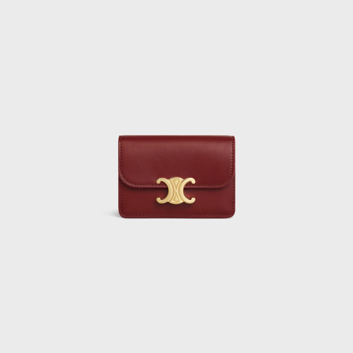 CARD HOLDER WITH FLAP TRIOMPHE IN SHINY CALFSKIN DARK RUBY